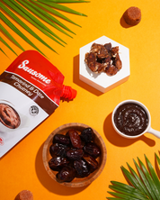 Swsome Tamarind & Date Chutney with dates on an orange background